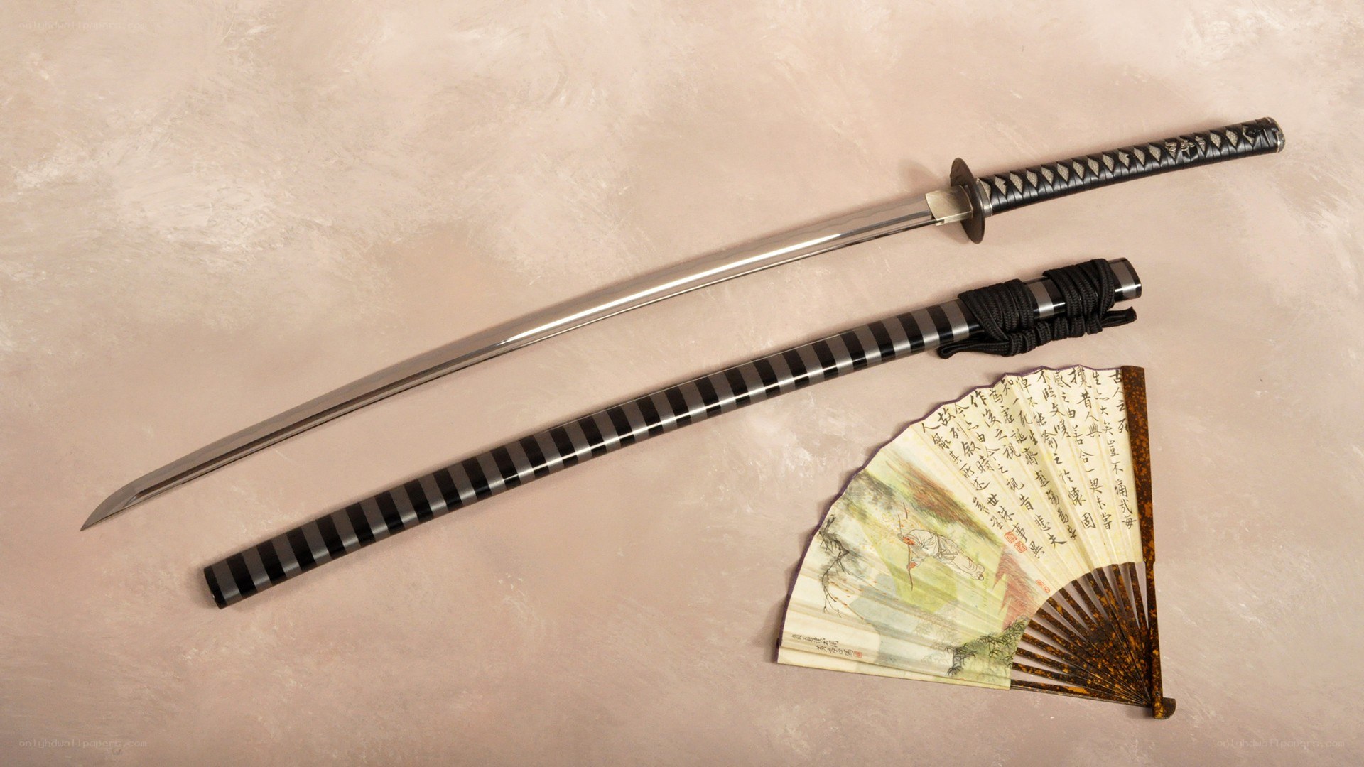 Katana and fan on display