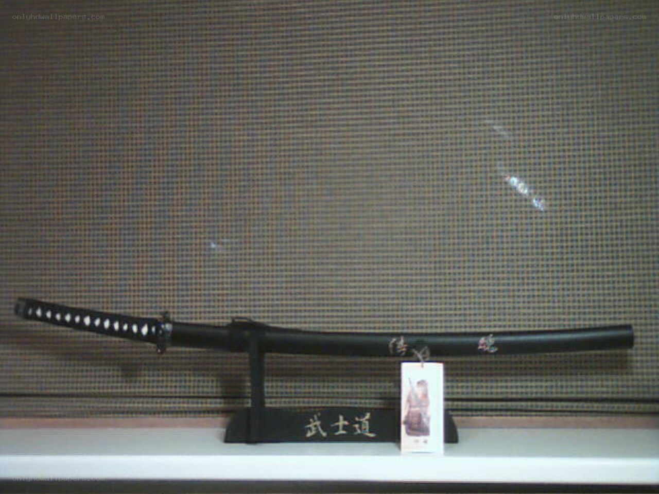 Katana on display stand
