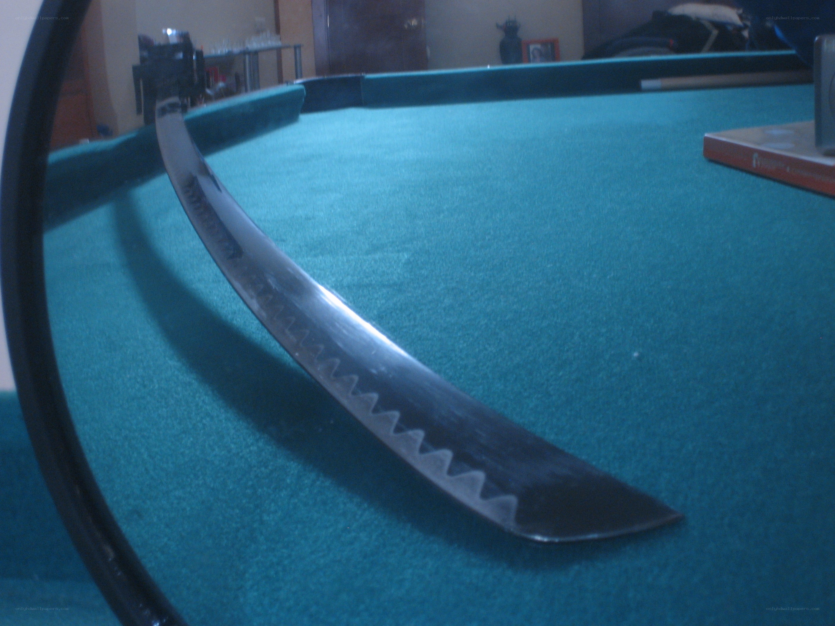 Katana on pool table