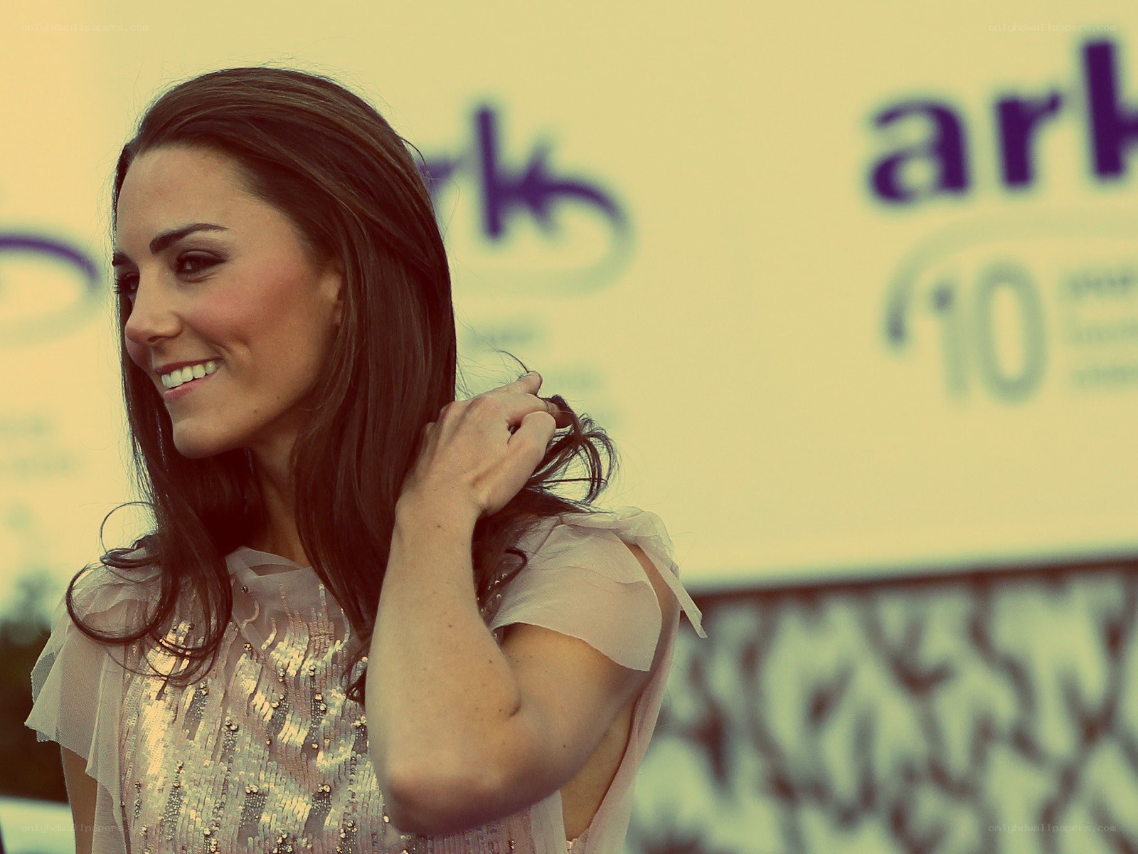Kate Middleton smiling at event