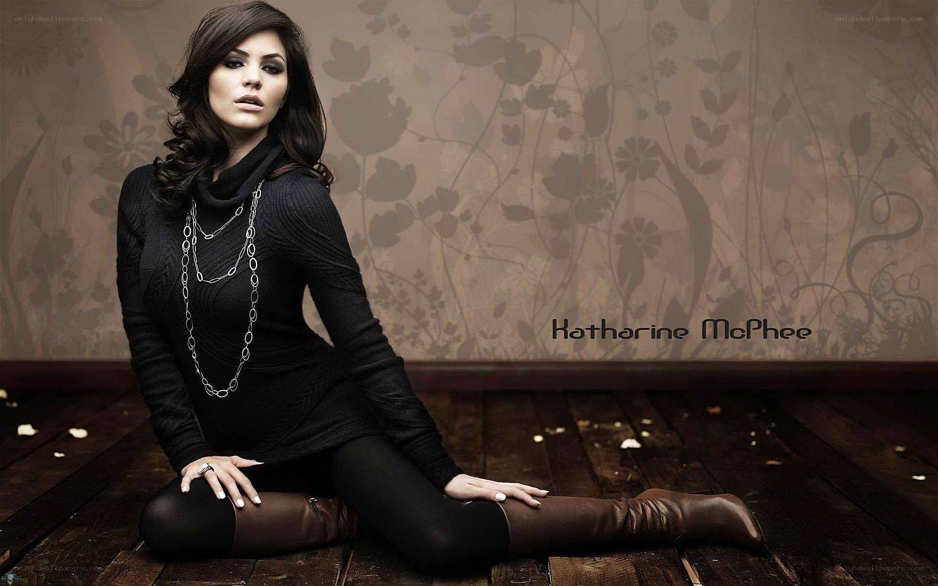 Katharine McPhee sitting on floor