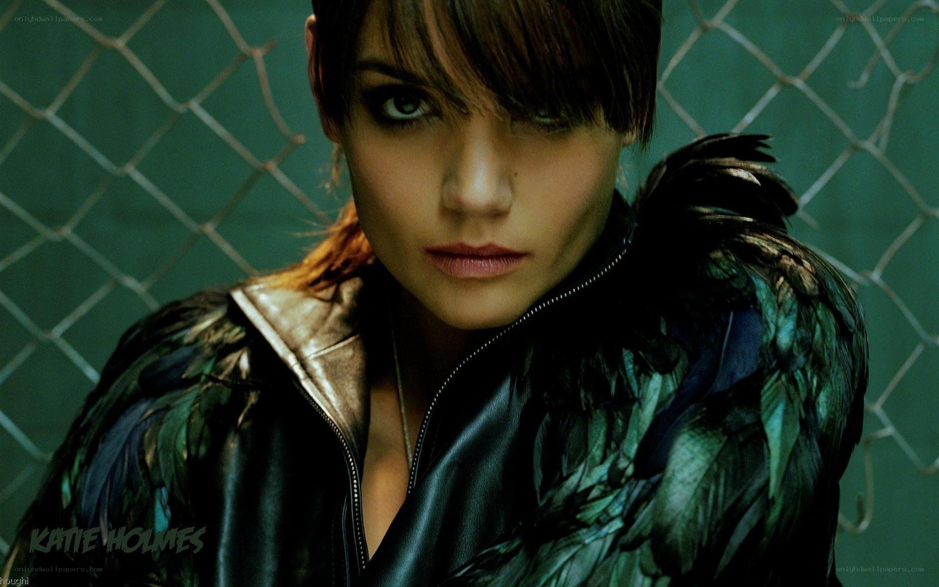 Katie Holmes in feathered jacket