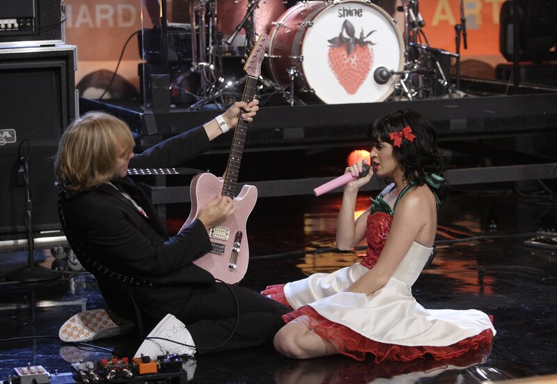 Katy Perry and guitarist on stage