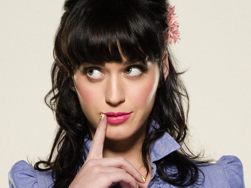 Katy Perry with finger to lips