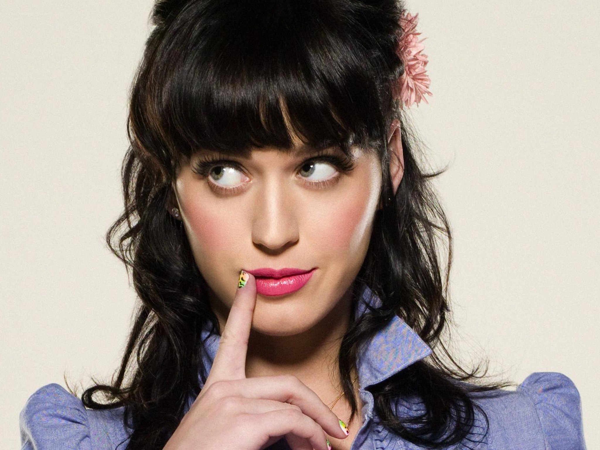 Katy Perry with finger to lips