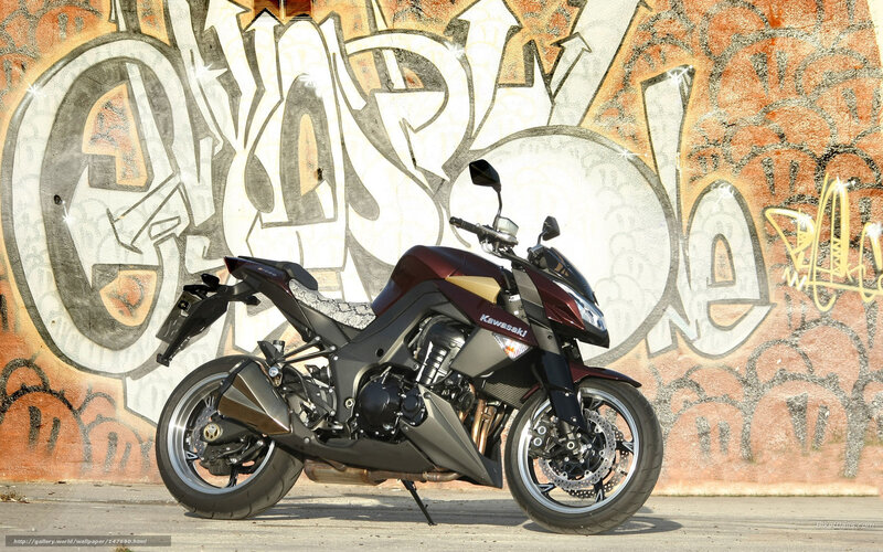 Kawasaki motorcycle in graffiti alley