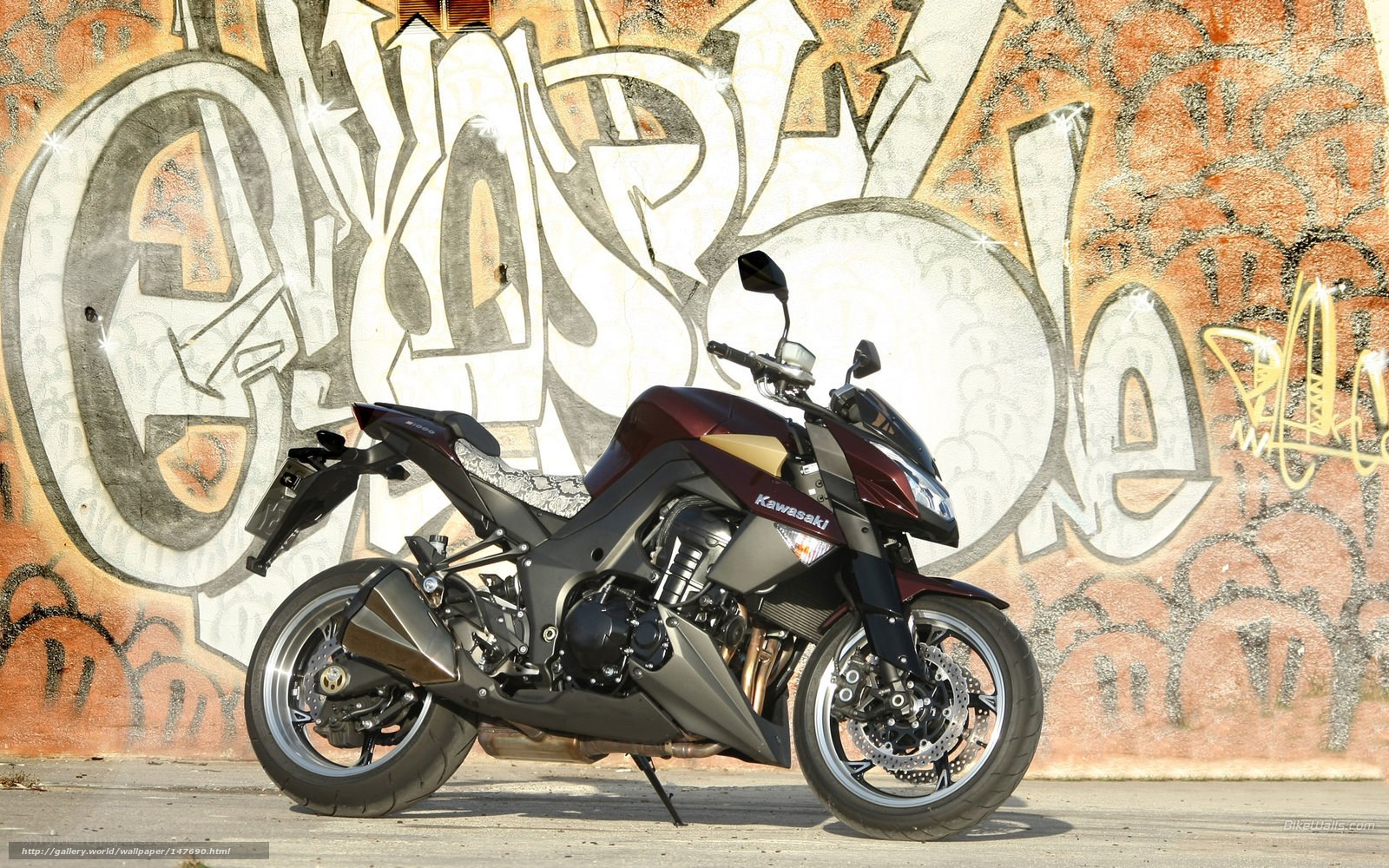 Kawasaki motorcycle in graffiti alley