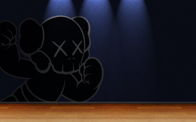 Kaws artwork on blue wall