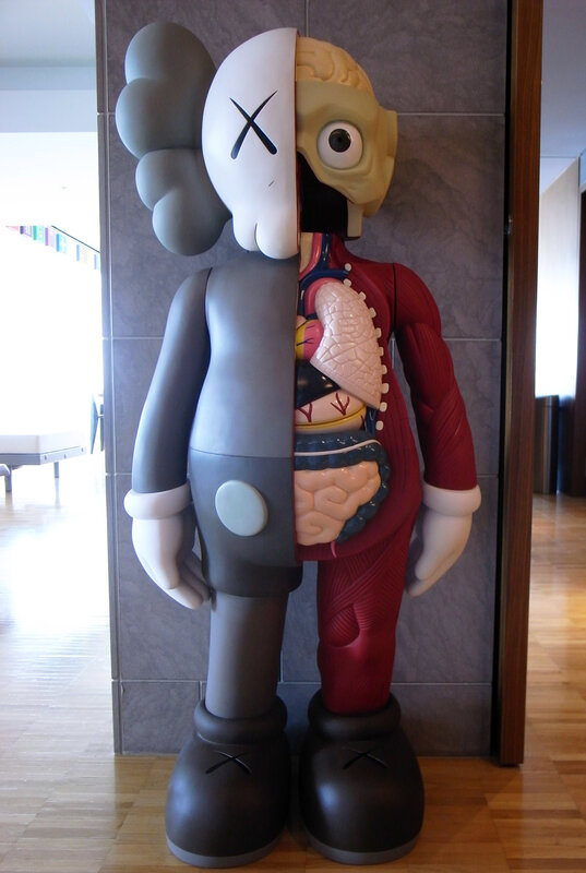 KAWS sculpture with anatomical details