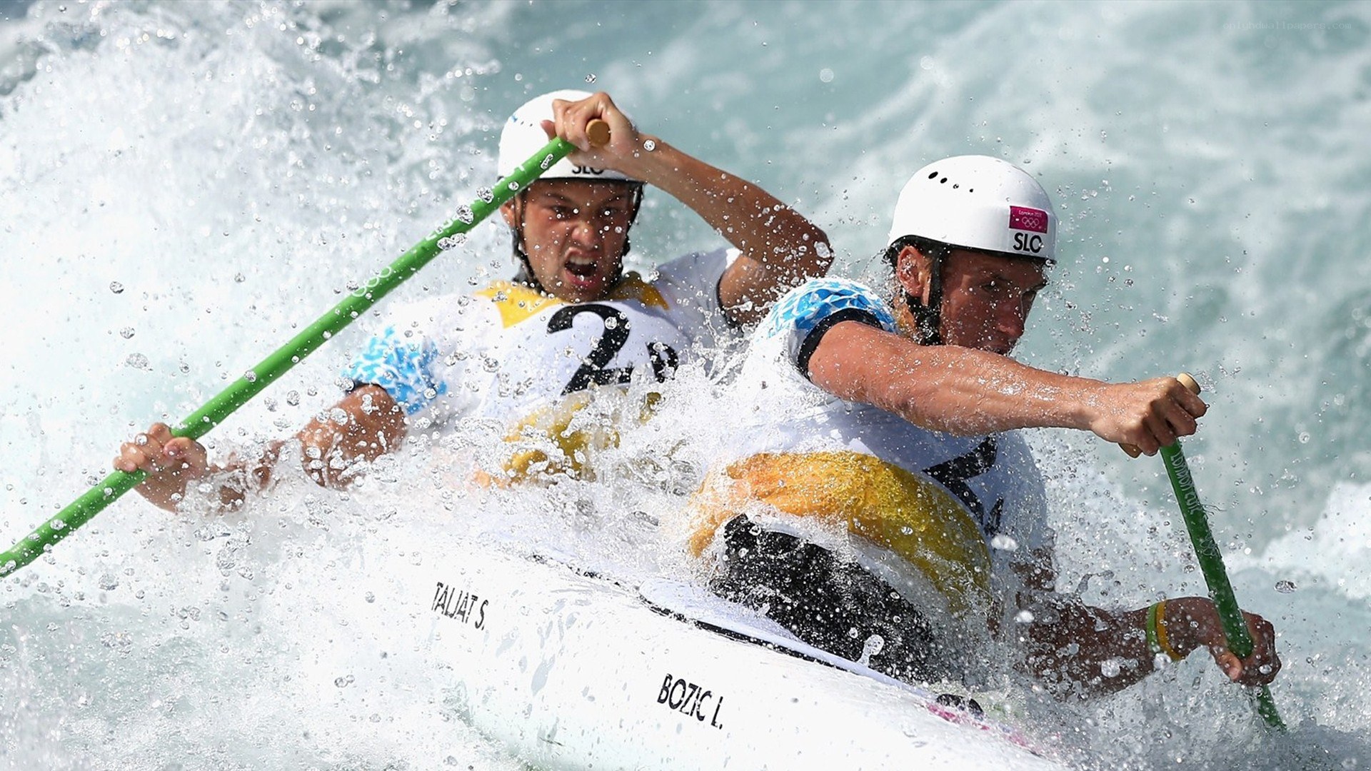 Kayak athletes in action
