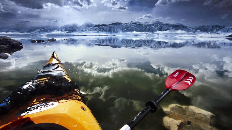 kayak on a calm mountain lake