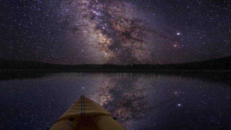 Kayak on Lake under Stars