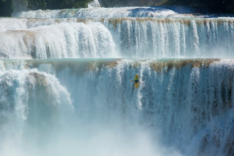 Kayaker at Waterfall — Blue
