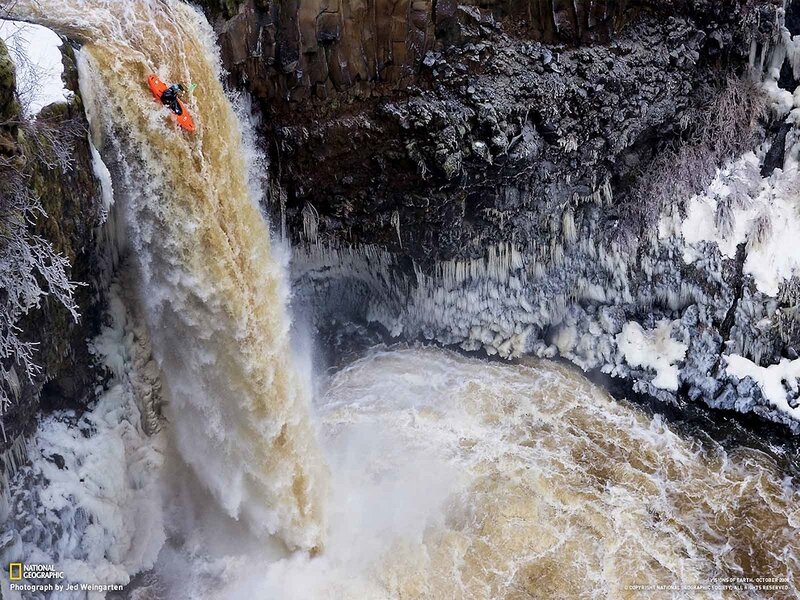 Kayaker Descending Waterfall — Brown
