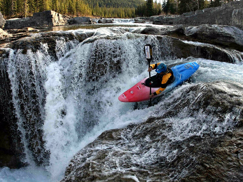 Kayaker Going over Waterfall — Blue