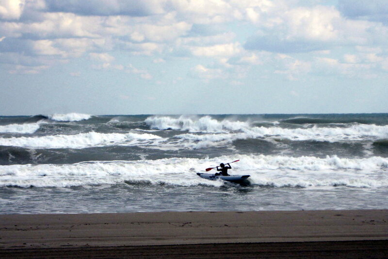 Kayaker in Ocean Waves