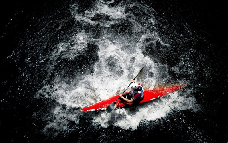 Kayaker in Rapids — Red, Dramatic