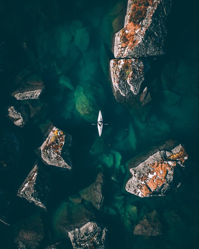 Kayaker in Rocky Water
