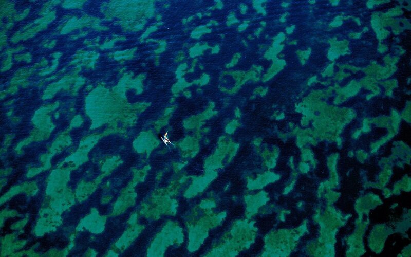 Kayaker in Turquoise Water — Blue, Serene