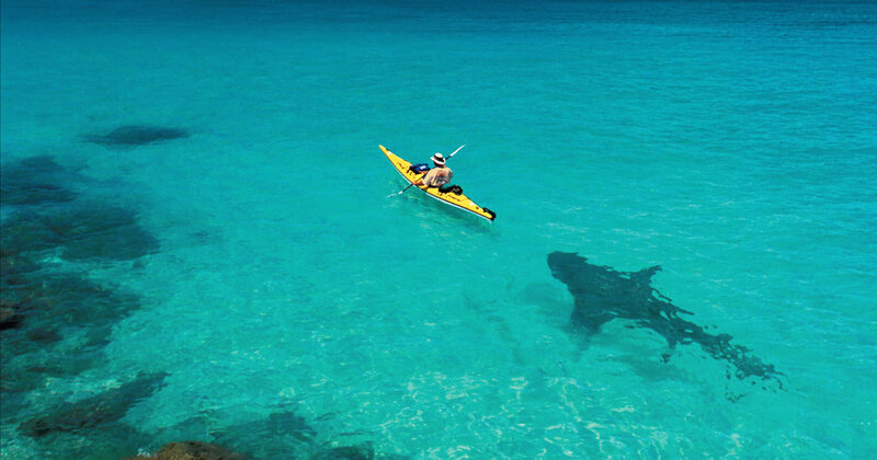 Kayaker in Turquoise Water — Blue