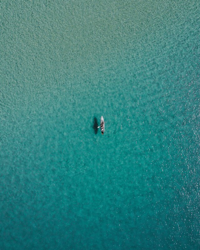 Kayaker in Turquoise Water — Serene