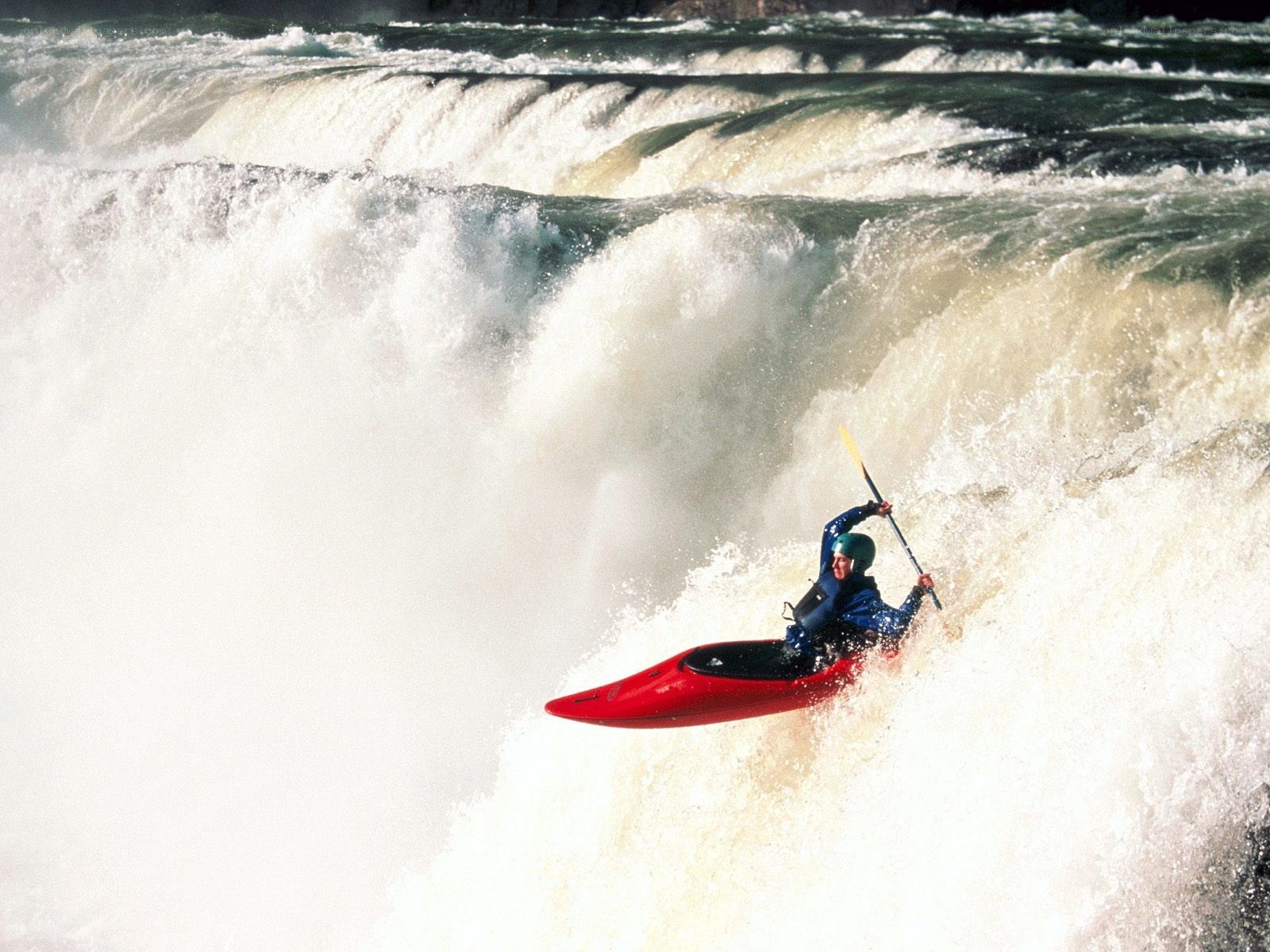 kayaker navigating rapids
