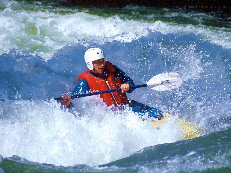 kayaker navigating rapids