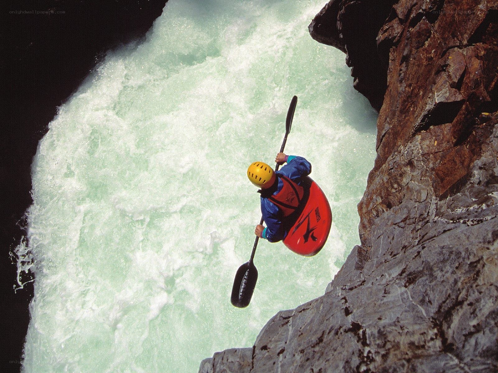kayaker navigating rapids