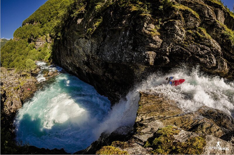 Kayaker navigating rapids