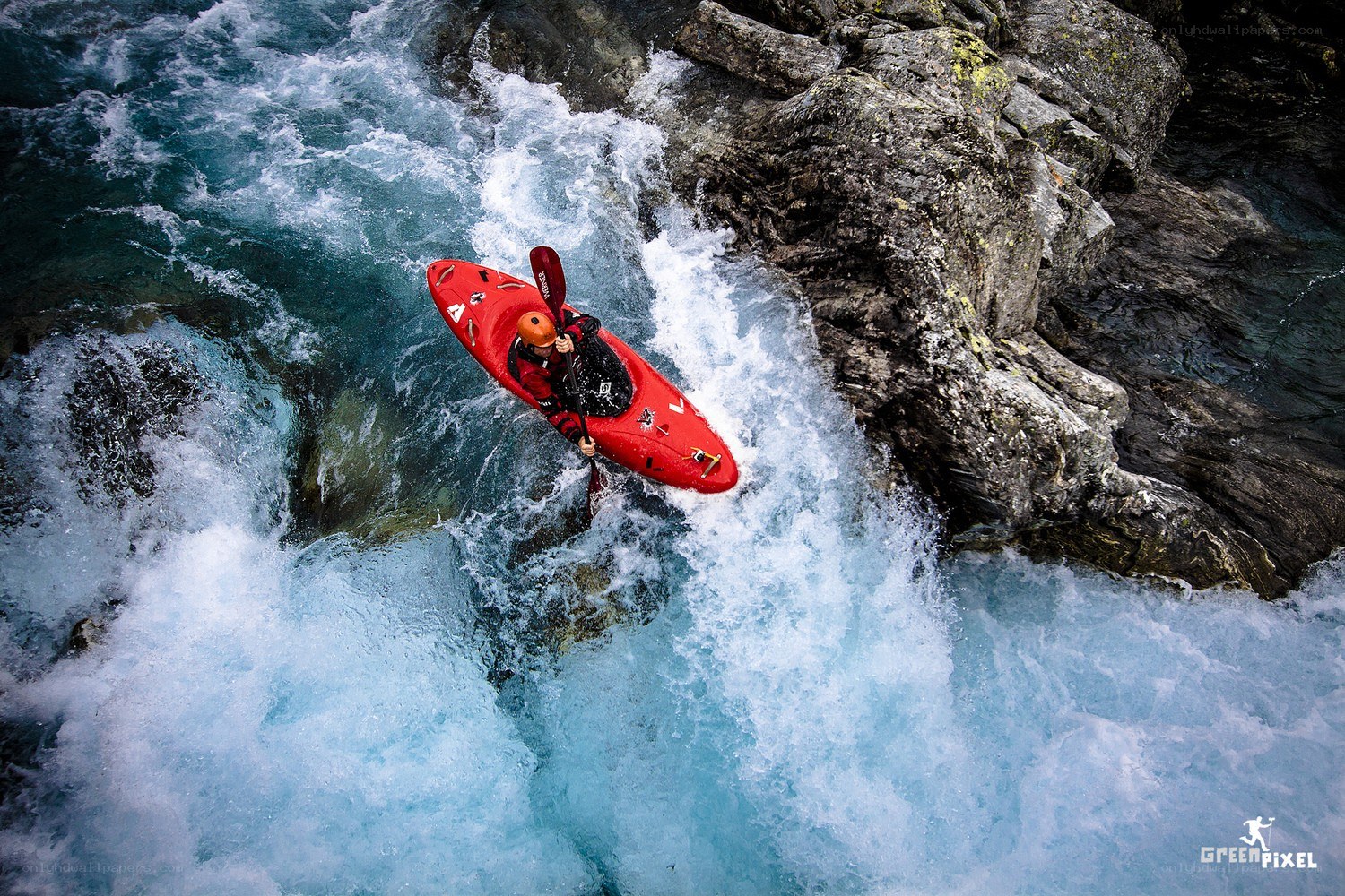 Kayaker navigating rapids