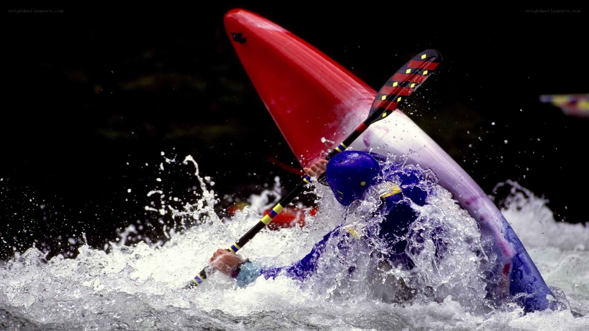 kayaker navigating whitewater