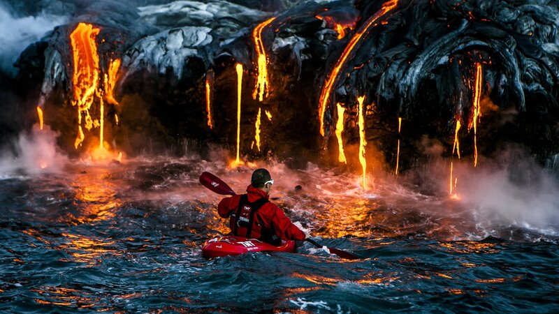 Kayaker Near Lava Flow