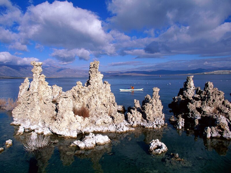 Kayaker Near Tufa Formations — Blue