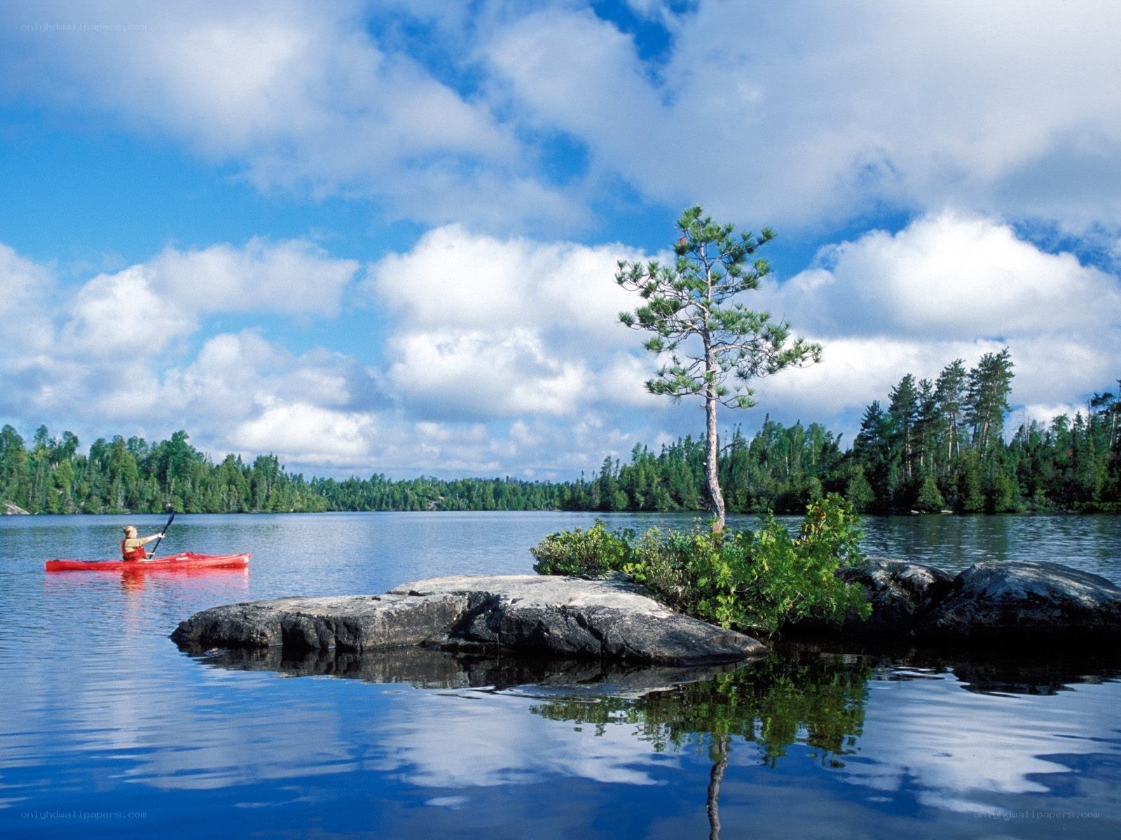 kayaker on a calm lake