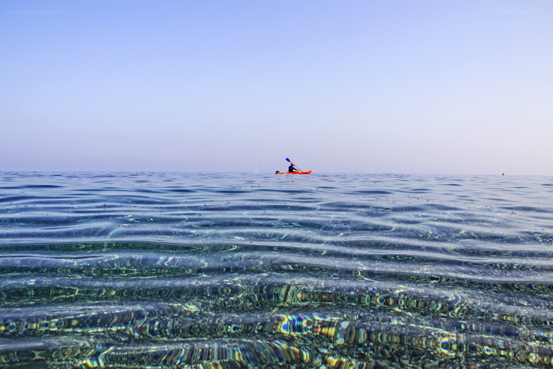 kayaker on calm sea