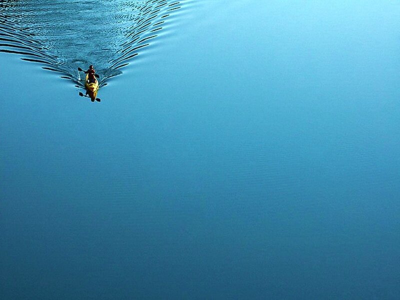 kayaker on calm water