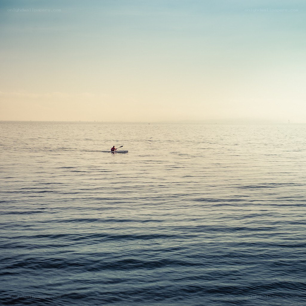 kayaker on calm water