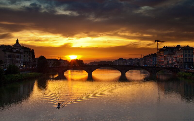 Kayaker on River at Sunset