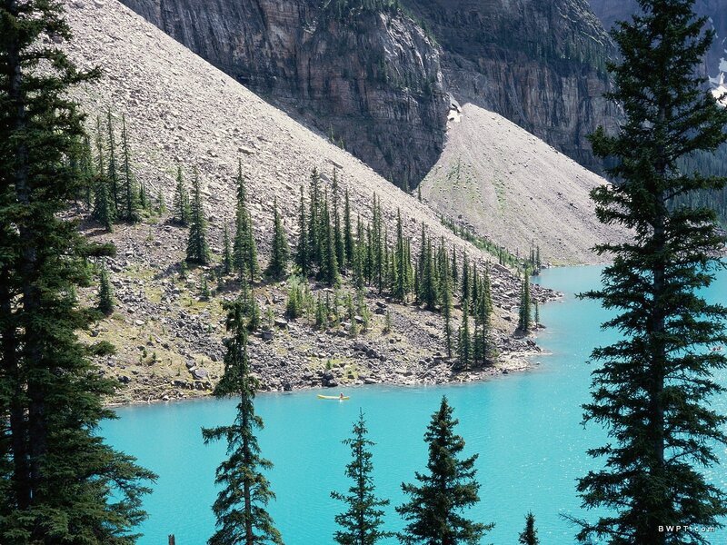 kayaker on turquoise lake