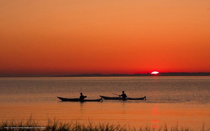 Kayakers at sunset