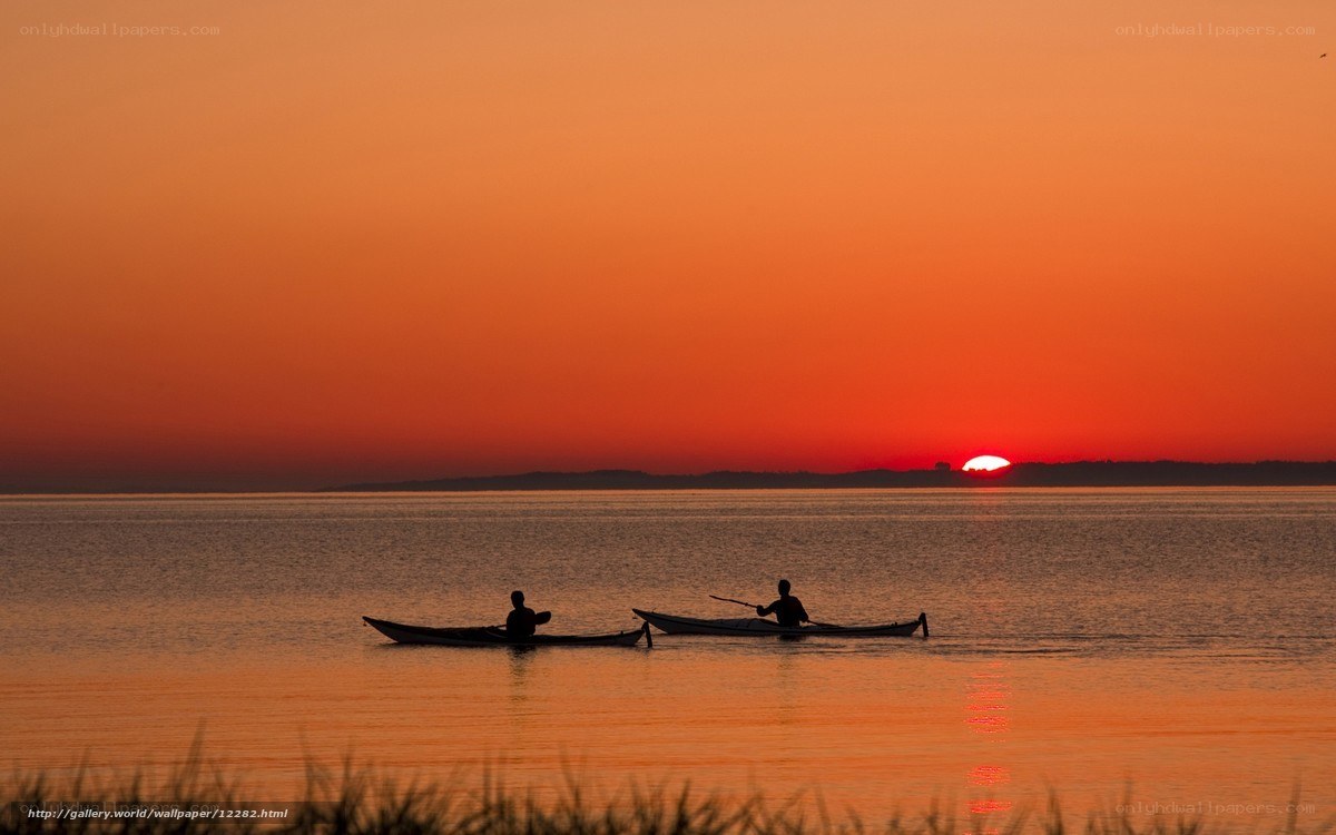 Kayakers at sunset