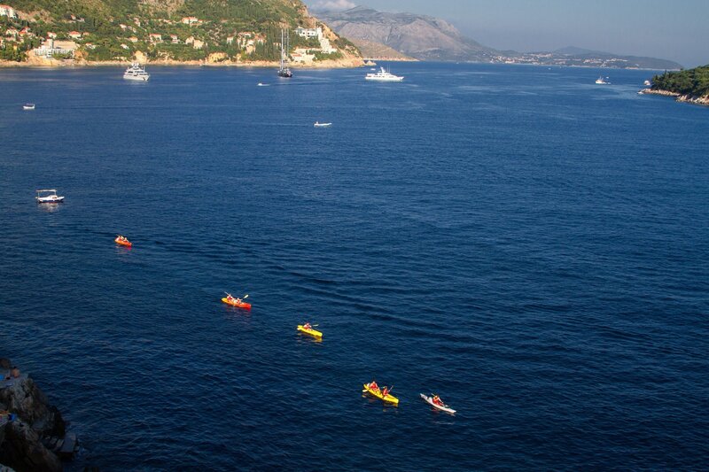 Kayakers in a coastal bay