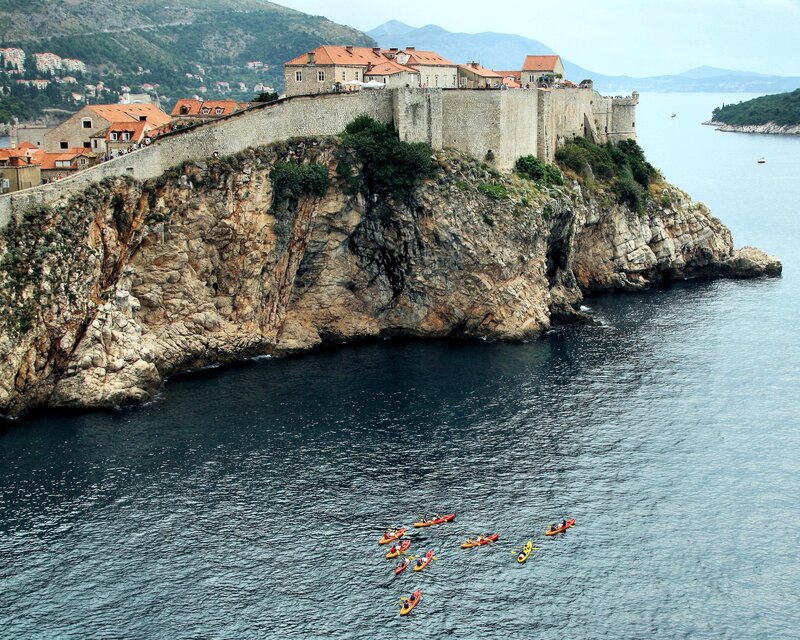 Kayakers near ancient city walls