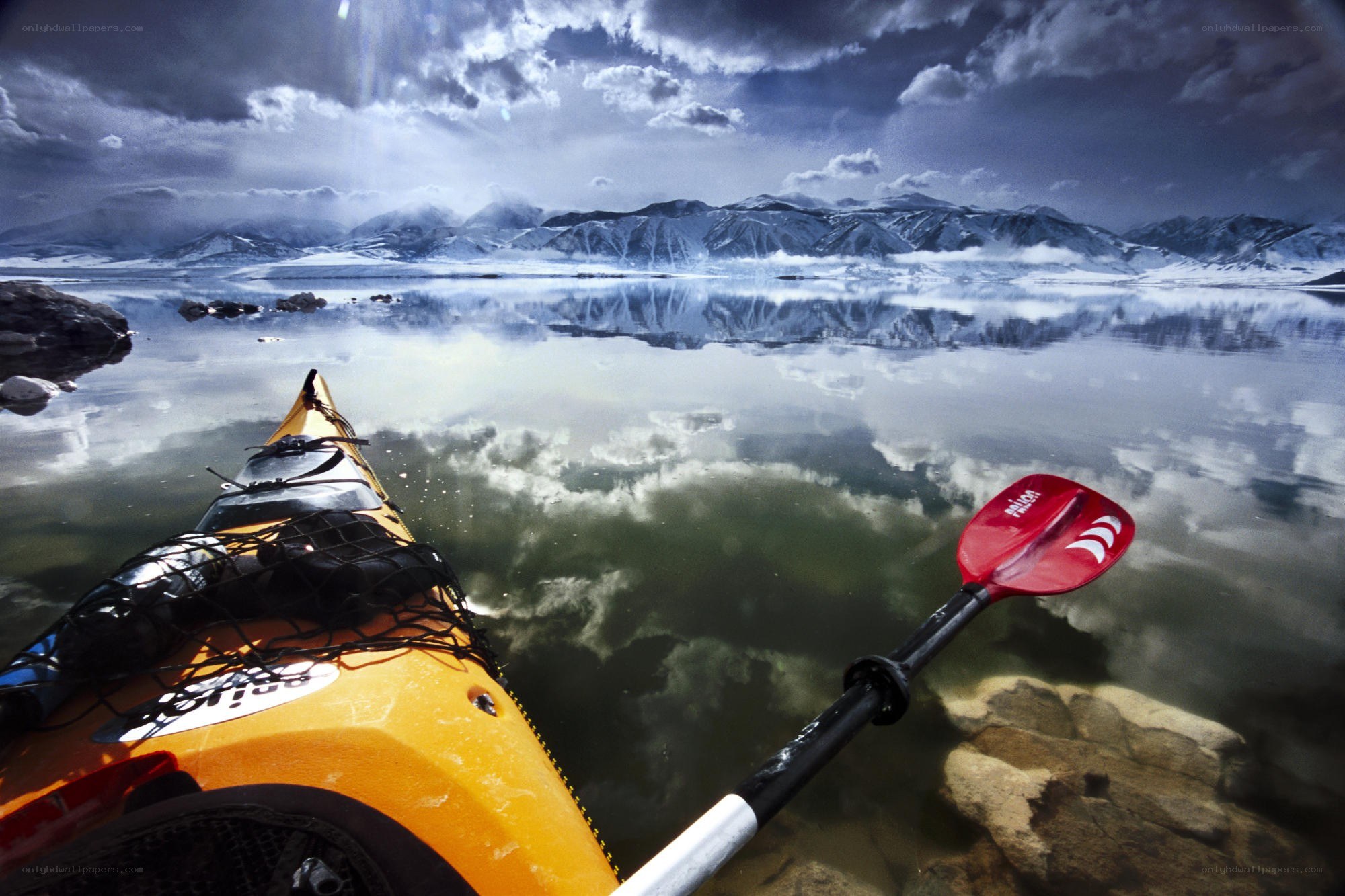 kayaking in a mountain lake