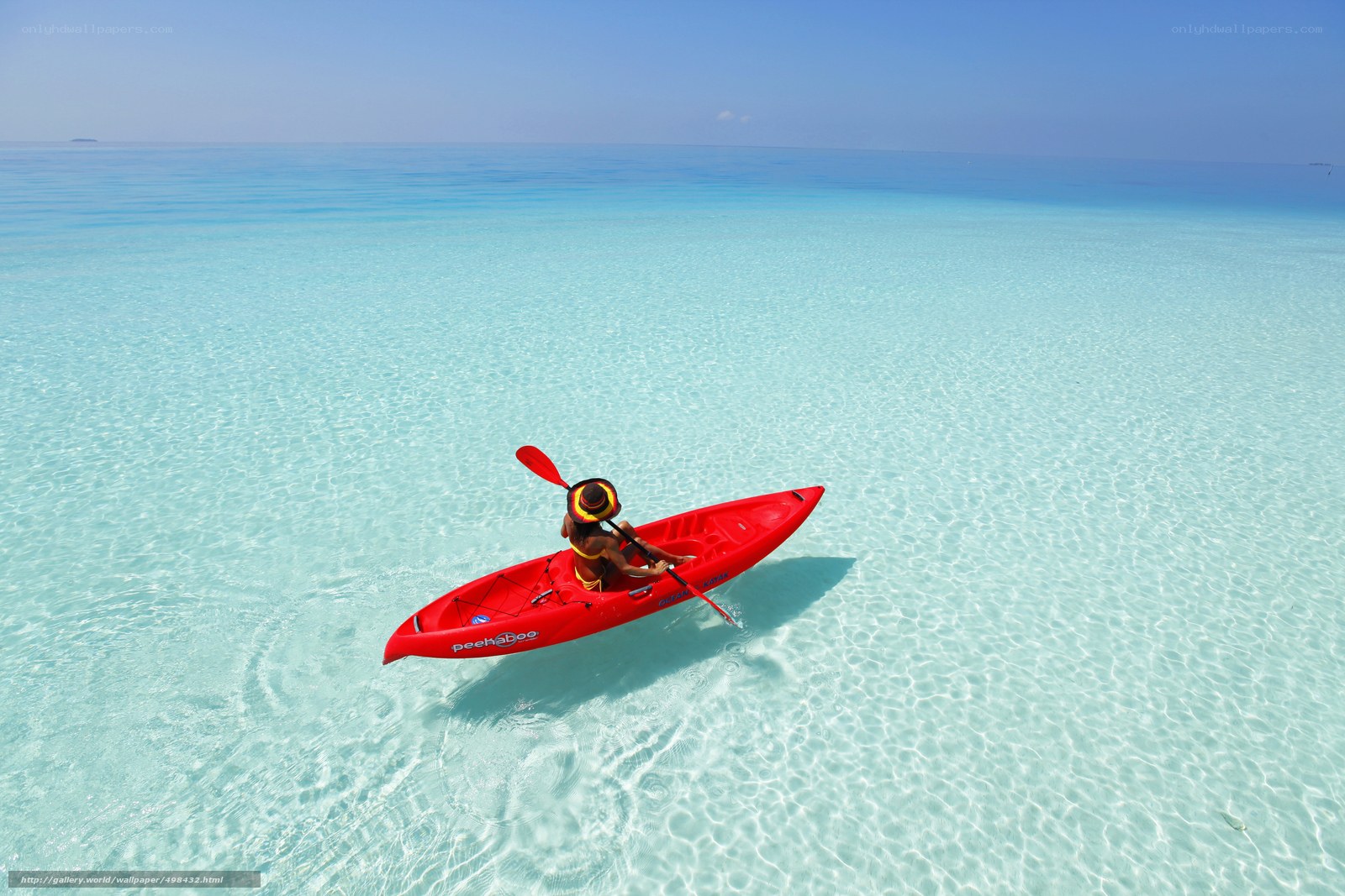 Kayaking in clear turquoise water