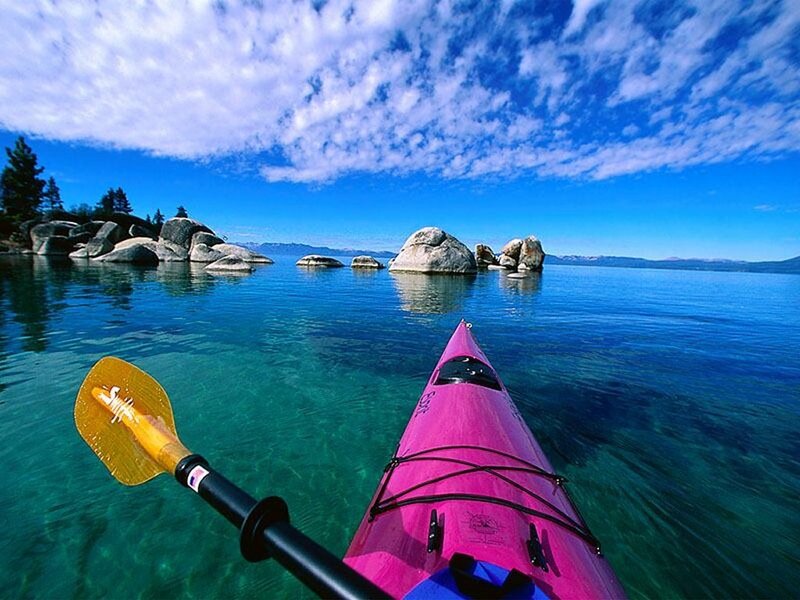 Kayaking on a clear lake