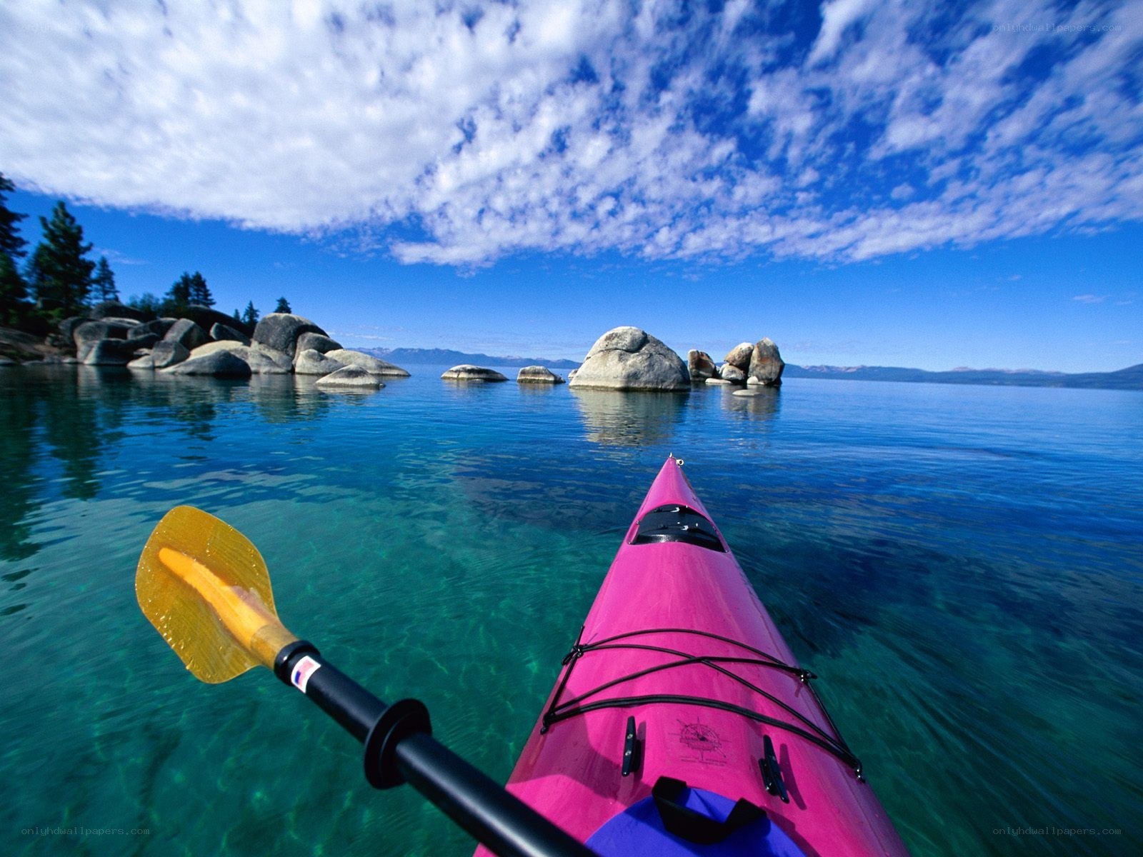 Kayaking on a clear lake