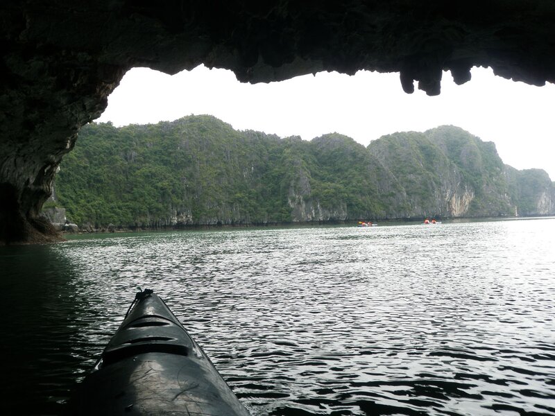 kayaking through a cave entrance
