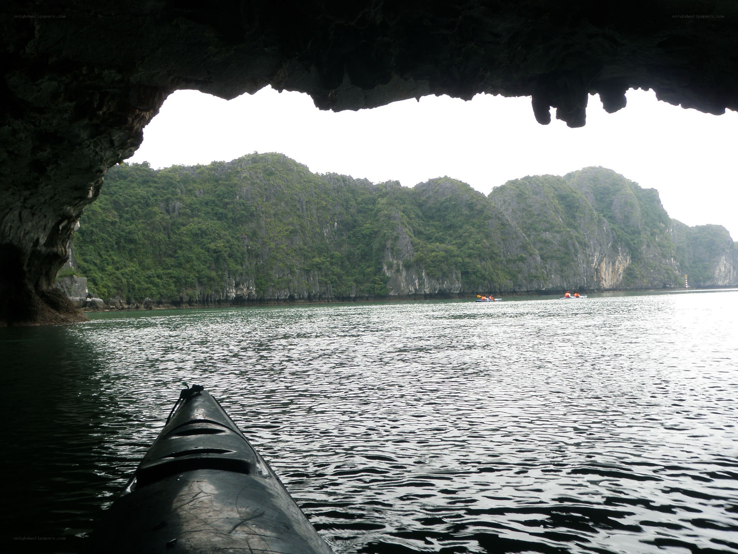 kayaking through a cave entrance