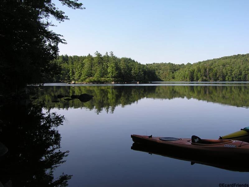 Kayaks on a calm lake